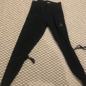 Gently used back lace up black leggings